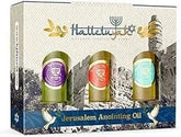 Set of 3 Anointing Oil from Israel bottles including Rose of Sharon, Myrrh and Frankincense, and Spikenard in decorative packaging